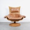 Montis leather swivel chair rattan design Berg